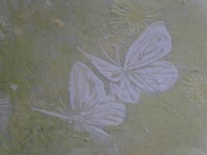 作品の中に描かれた蝶
