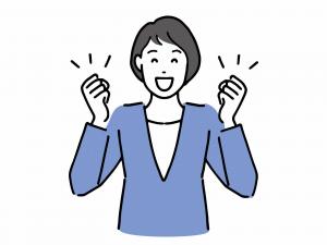 ガッツポーズの女性画像